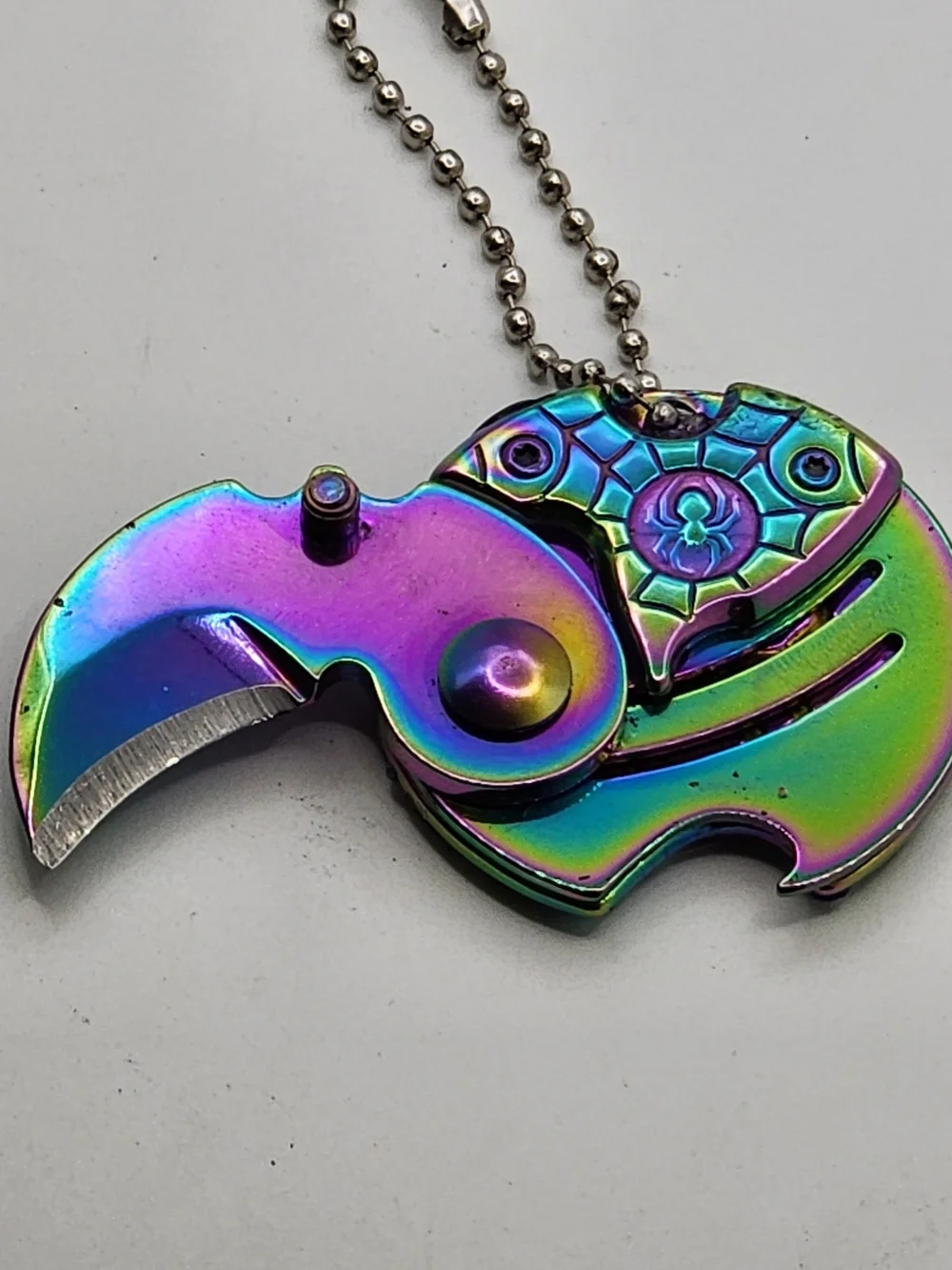 Iridescent Spider Disc Keychain Knife with Crystal Accents